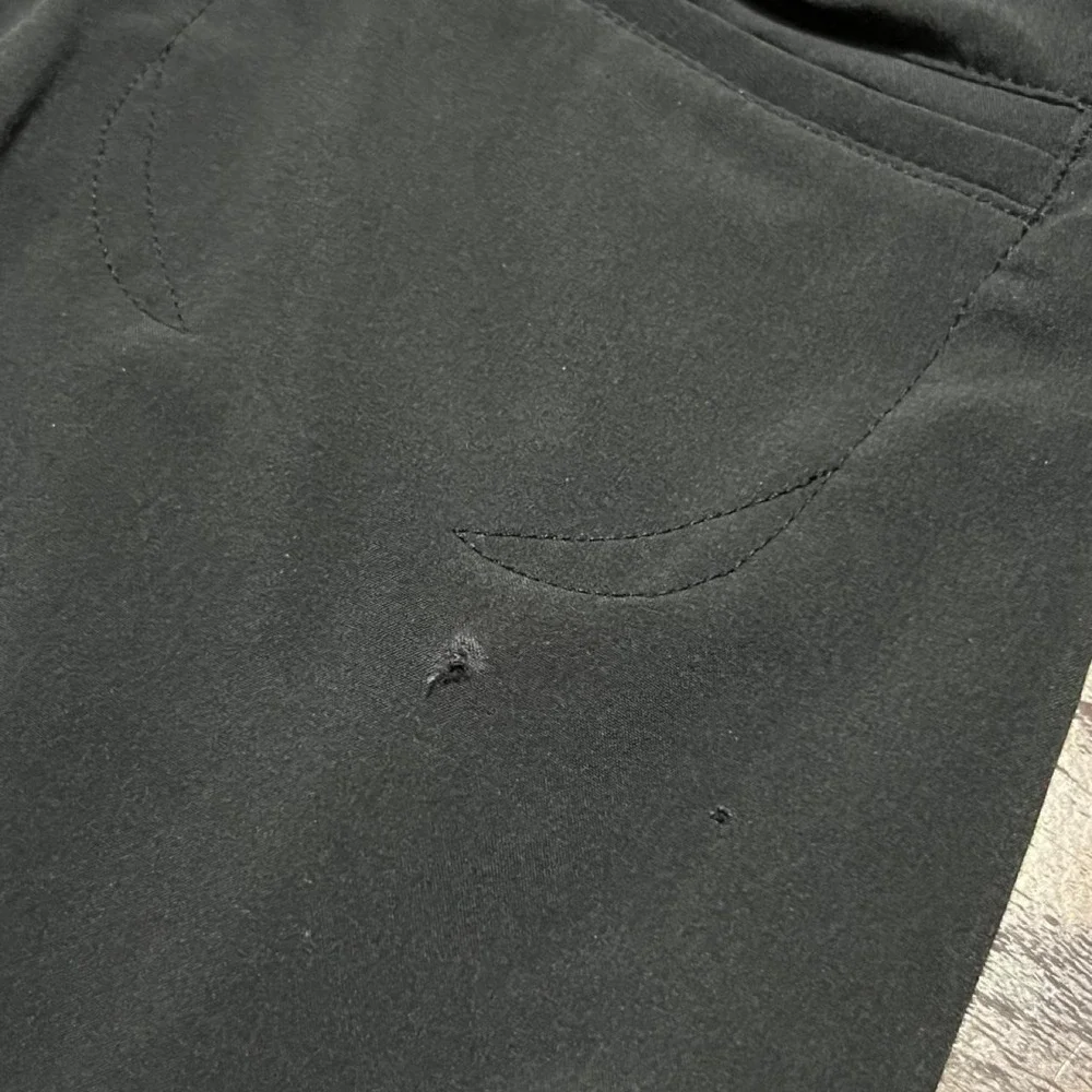 Brooks black running shorts with white side stripes 314.5